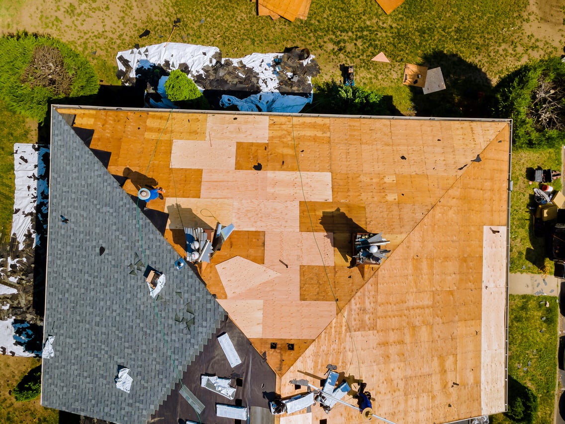 Demolition Removal of an Old Asphalt Shingle Roof That Was Installed New Shingle Roof